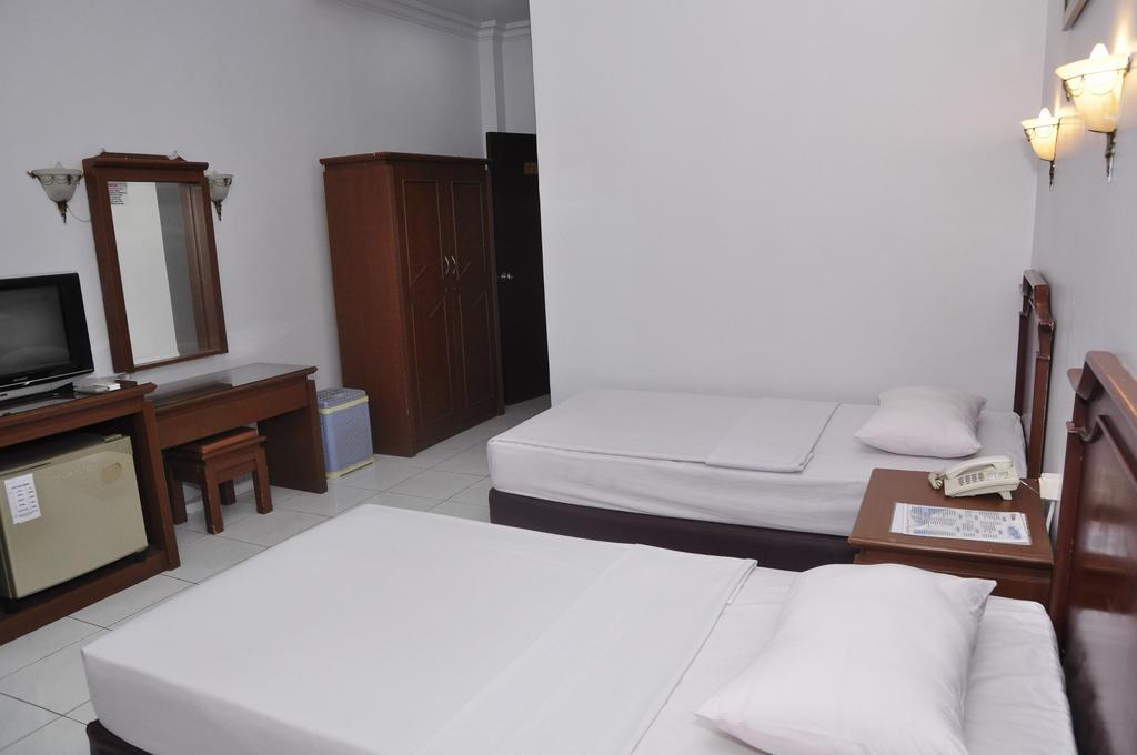 Hotel Andhika Syariah Samarinda Szoba fotó