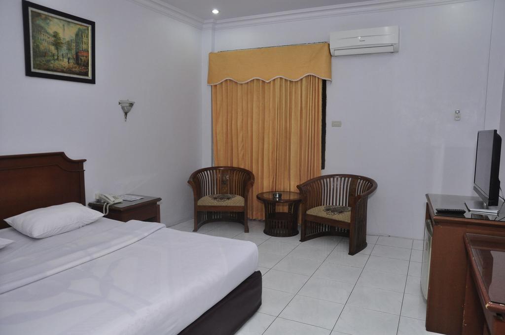 Hotel Andhika Syariah Samarinda Szoba fotó